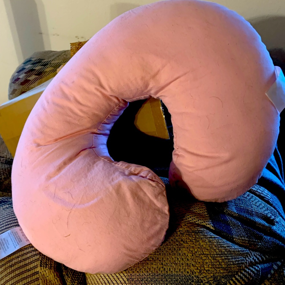 Boppy nursing pillow in light pink